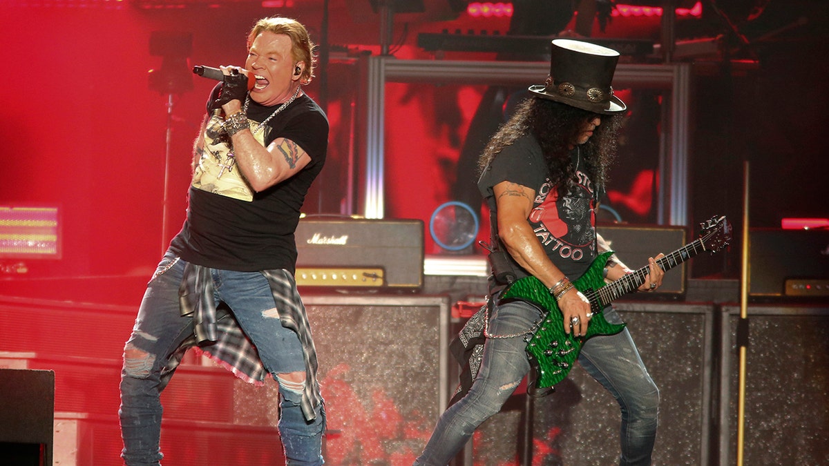 Slash and Axl Rose onstage