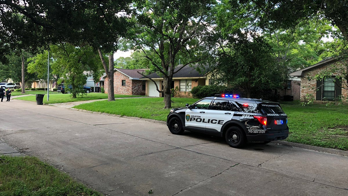 Police rescued 10 people held inside a Houston home Wednesday in what investigators suspect was a human smuggling operation.