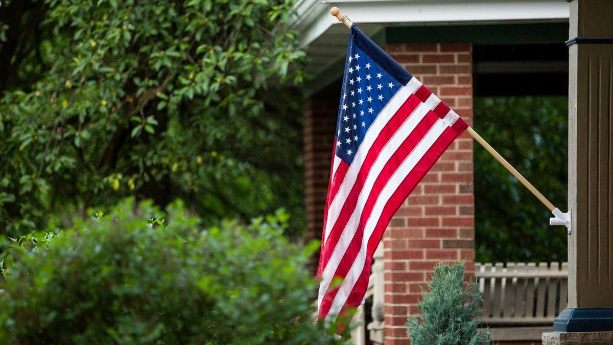 Americans who observe Flag Day often display the national flag in a prominent location. (iStock)