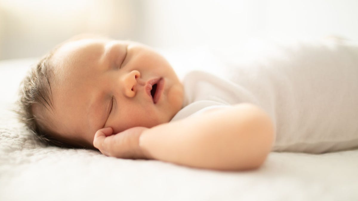 What helps 2024 a newborn sleep