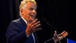 Winner of the Virginia Democratic gubernatorial primary, former Virginia Gov. Terry McAuliffe, gestures as he addresses the crowd during an election party in McLean, Va., Tuesday, June 8, 2021. McAuliffe faced four other Democrats in Tuesday's primary. (AP Photo/Steve Helber)