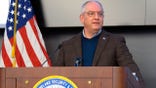 FILE - In this Tuesday, Jan. 12, 2021 file photo, Louisiana Gov. John Bel Edwards speaks about the state's COVID-19 outbreak and vaccination efforts in Baton Rouge, La. Gov. John Bel Edwards has agreed to turn off federal pandemic unemployment payments at the end of July in exchange for a long-term, modest boost to Louisiana's jobless benefits, announcing Wednesday, June 16, 2021 that he's signed a bill that makes the trade.(AP Photo/Melinda Deslatte, File)