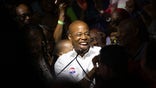 Mayoral candidate Eric Adams mingles with supporters during his election night party, late Tuesday, June 22, 2021, in New York. (AP Photo/Kevin Hagen)