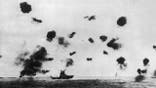 The Battle of Midway Island, which resulted in a major victory for the US fleet. The USS aircraft carrier 'Yorktown' received a direct hit from a Japanese plane which got through despite the heavy barrage put up by American destroyers.   (Photo by Keystone/Getty Images)