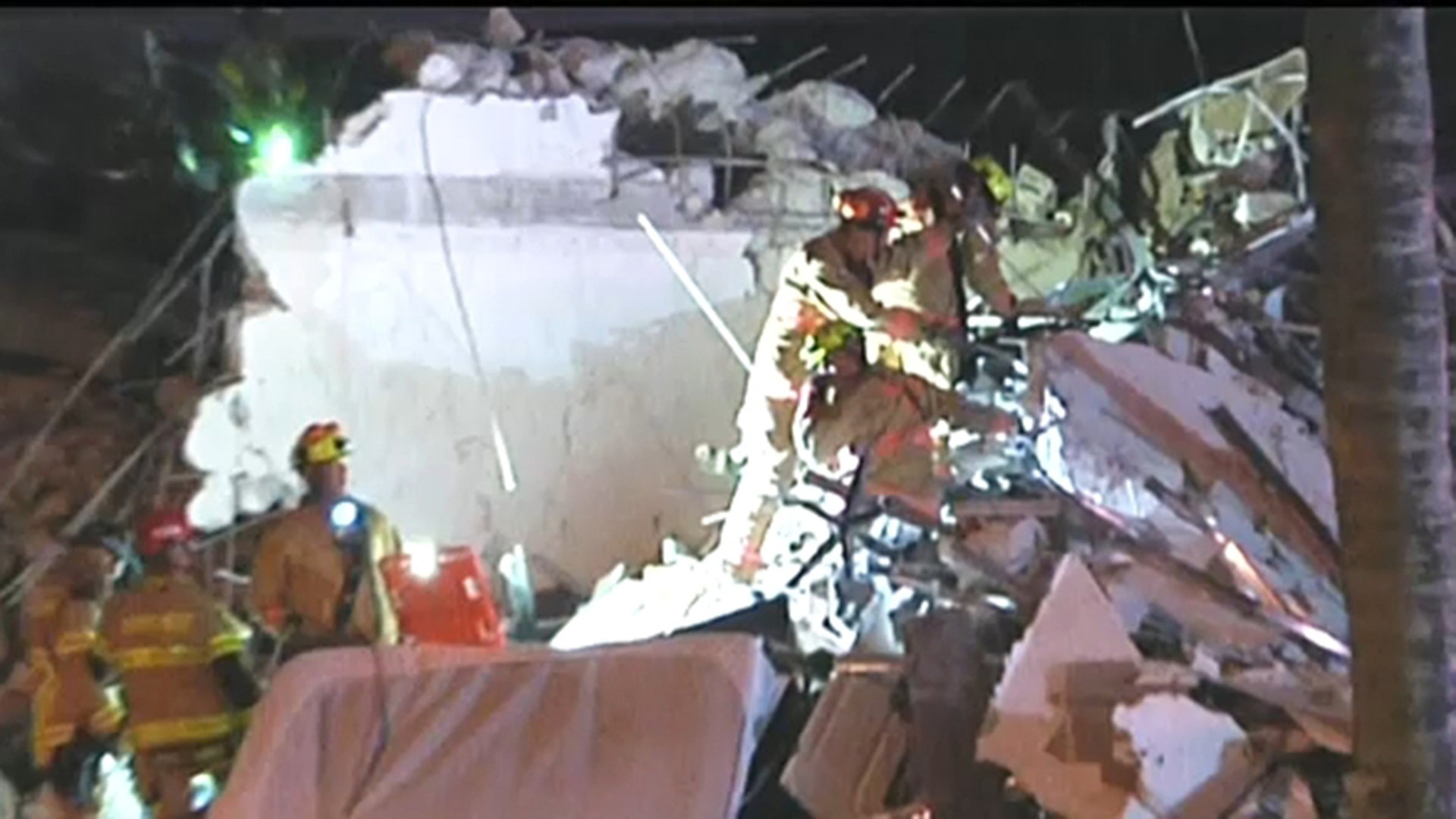 Miami-Dade fire rescue pull a boy from the rubble alive.