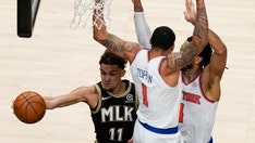 Atlanta's Trae Young shines in first trip to NBA playoffs