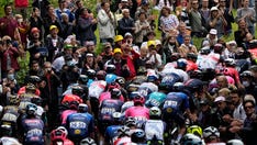 French authorities launch investigation after Tour de France spectator causes massive pileup