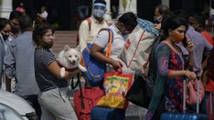 India cautiously starts to open up as coronavirus cases decline