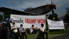 Guatemala protesters display signs telling Harris to 'mind your own business'