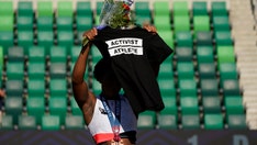 IOC allows athlete protests before Olympic events, bars political gestures on podiums and during competition