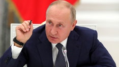 Putin calls accusation of cyberattacks against US 'farcical'