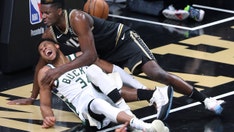 Bucks' Giannis Antetokounmpo suffers knee injury, status unclear for rest of playoffs