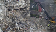 Families of the missing visit site of Florida condo collapse