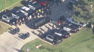 Colorado police officer among 3 dead in shooting at shopping district