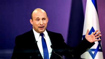 Israel’s fragile coalition government gets first test, launches airstrikes on Hamas