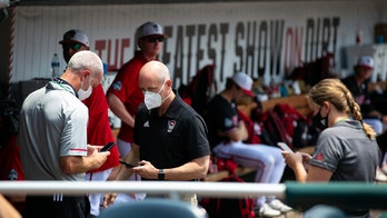 COVID-19 scare leaves Wolfpack with 13 players for CWS game