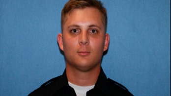 Phoenix police officer dead after rollover crash linked to red-light runner