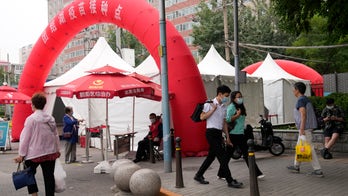 China pushes ahead with aggressive vaccination effort after slow start