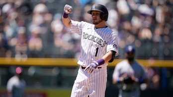 Rockies win 11-6, sending Rangers to 15th straight road loss