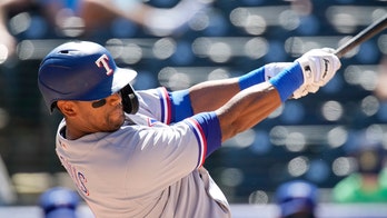 Khris Davis DFA'd by Rangers, who want look at young players