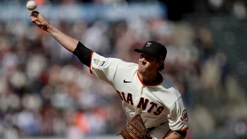 Gausman fans 10 in 7 innings, Giants edge Cubs 4-3