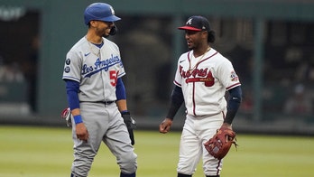 Albies, Almonte power Braves past Dodgers in 6-4 win