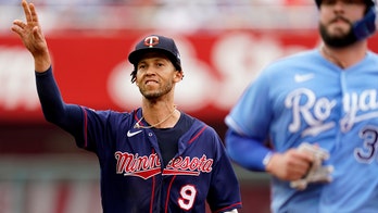 Sanó starts triple play, Twins edge Royals 2-1