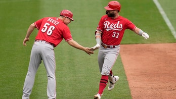 Winker's 3 homers lift Reds over Cards 8-7 for 4-game sweep