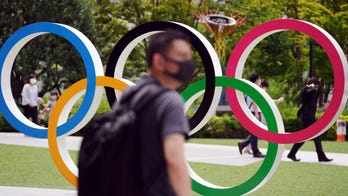 Japan to ease COVID-19 state of emergency ahead of Olympics