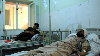 Afghanistan attack on anti-land mine charity kills at least 10, wounds 14
