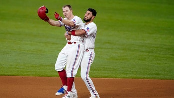 Holt walk-off hit for Rangers in 4-3 win over Giants in 11