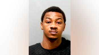 Former Michigan State star to remain in jail in murder case