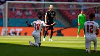 England players booed for taking a knee despite plea by team