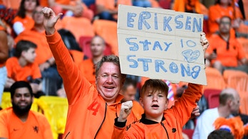 Fans in Amsterdam show support for Eriksen