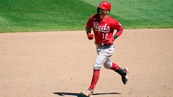 Naquin's 3-run homer in 9th gives Reds 10-7 win over Twins