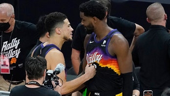 Suns' Devin Booker scuffles with Clippers' DeMarcus Cousins after game-winner