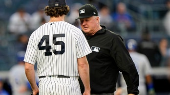 Cole's strikeouts, spin rate down, Royals rally past Yanks