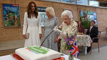 Queen Elizabeth cuts cake with sword instead of standard knife: 'More unusual'
