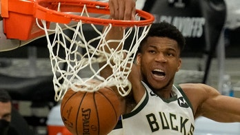 Bucks' Giannis Antetokounmpo leads team with 34 points and one cellphone catch in Game 4 victory