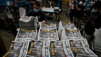 Hong Kong’s pro-democracy paper Apple Daily will close