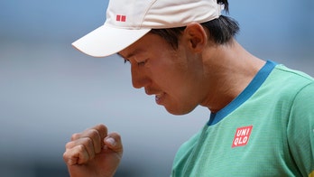 Nishikori grinds out another 5-set win at French Open