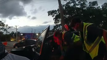 Florida paramedic recalls springing into action as driver pulls loaded gun on responders