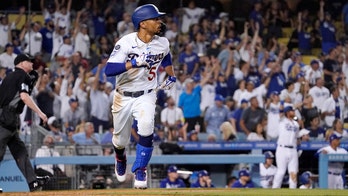 Betts homer in front of 52,078 leads Dodgers over Phillies