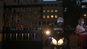 Greek priest charged over acid attack on 7 senior bishops