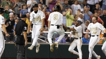 Vanderbilt eliminates Stanford on walk-off wild pitch to keep College World Series hopes alive