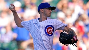 Davies sharp, Cubs beat Cardinals 2-0 for 3-game sweep