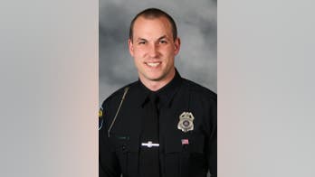 Wisconsin police commend officer who saved unconscious woman from a river