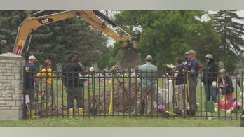 FBI, Detroit police dig in cemetery to confirm graves properly marked