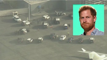 Suspect arrested after driving through gate onto LAX airfield as Prince Harry waited for flight to UK: reports