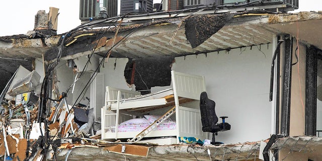 The partially collapsed Champlain Towers South condo in Surfside, Florida, is seen here Thursday. 